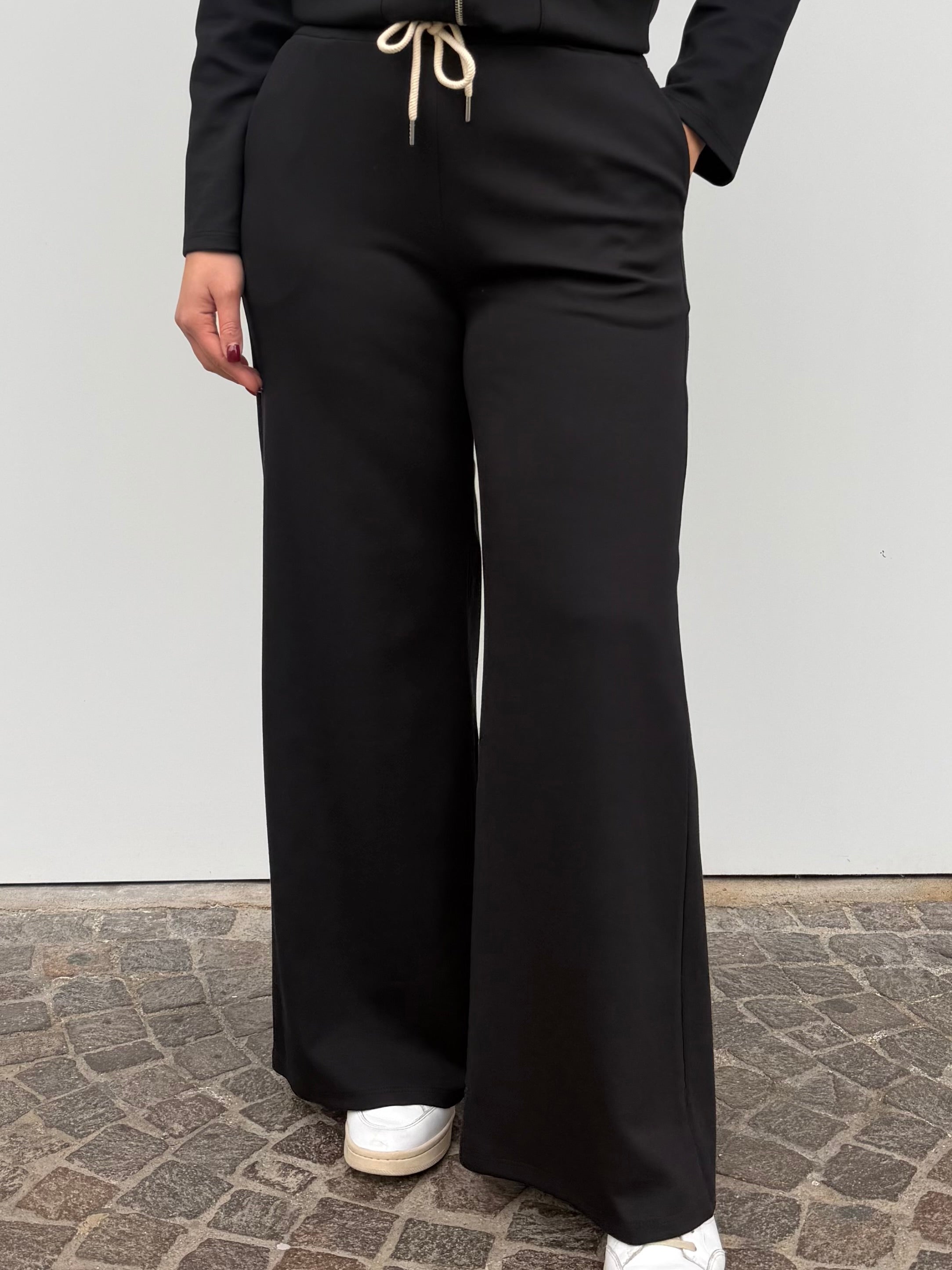 Pantalone tuta a palazzo